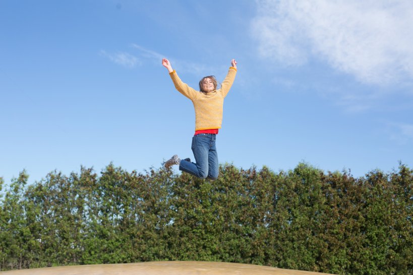 https://burst.shopify.com/photos/happy-woman-jumps-on-trampoline
